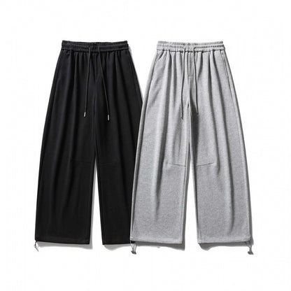 Unisex Wide Sweatpants with drawstring waistband, cord drawstring, and adjustable leg straps Shop Velvia