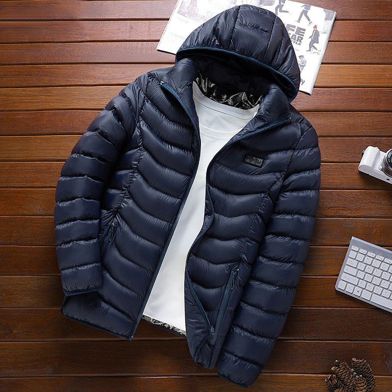 Men's ultralight quilted down jacket with hood, wind-resistant outer shell and packing function Shop Velvia