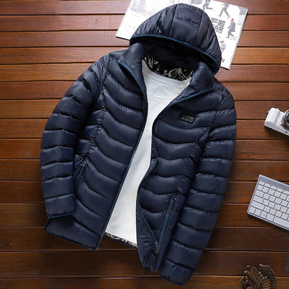 Men's ultralight quilted down jacket with hood, wind-resistant outer shell and packing function Shop Velvia