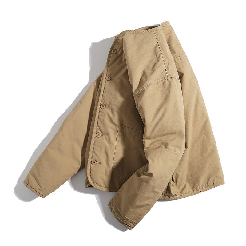Unisex Lightly Quilted Round Neck Transitional Jacket with Button Placket and Patch Pockets Shop Velvia