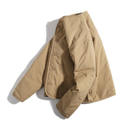 Unisex Lightly Quilted Round Neck Transitional Jacket with Button Placket and Patch Pockets Shop Velvia