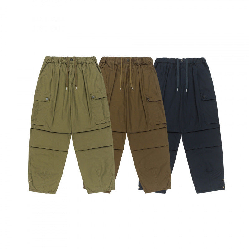 Unisex Oversize Cargo Pants with drawstring waistband, layer detail and snap hem Shop Velvia