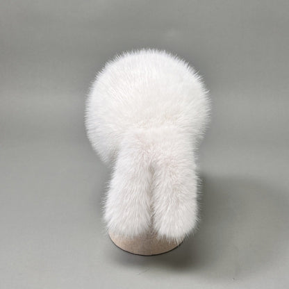 Women’s plush faux fur trapper hat with earflaps and decorative tail Shop Velvia