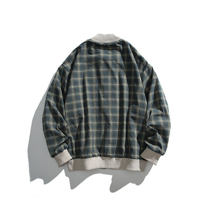 Unisex boxy bomber jacket in herringbone look with ribbed cuffs, flap pockets, and concealed snap button placket Shop Velvia