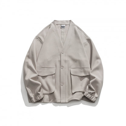Unisex Oversize cardigan with large flap pockets and waffle texture Shop Velvia