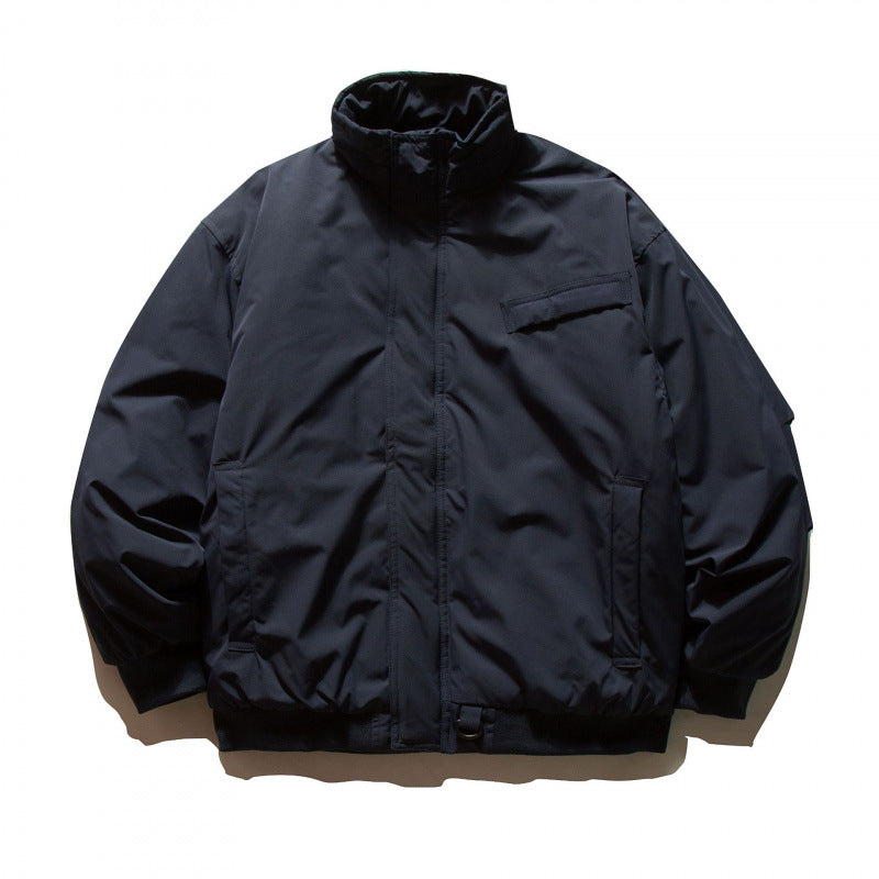 Unisex Boxy-padded transition jacket with high stand-up collar and utility pockets Shop Velvia