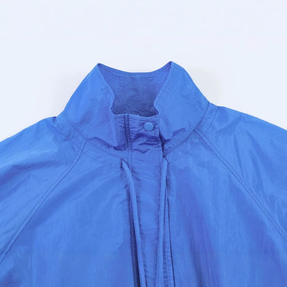 Women's Lightweight Wind and Travel Jacket with Stand Collar, Concealed Snap Placket and Drawstring Hem Shop Velvia