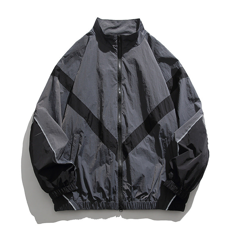[Unisex] Oversize technical wind and rain jacket with stand-up collar, reflective piping, and elastic hem Shop Velvia