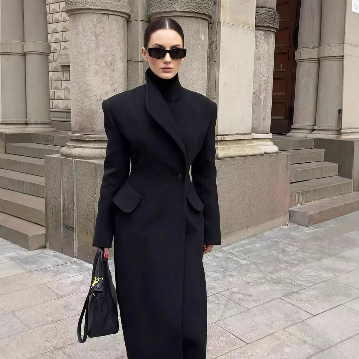 Women Tailored Long Coat with distinctive shoulder pads and asymmetric lapel Shop Velvia