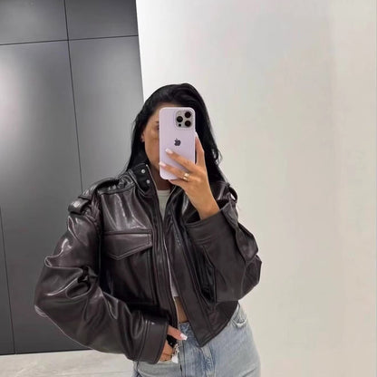 Women Short-Cut Leather Bomber with High Stand Collar, Shoulder Straps and Flap Pockets Shop Velvia