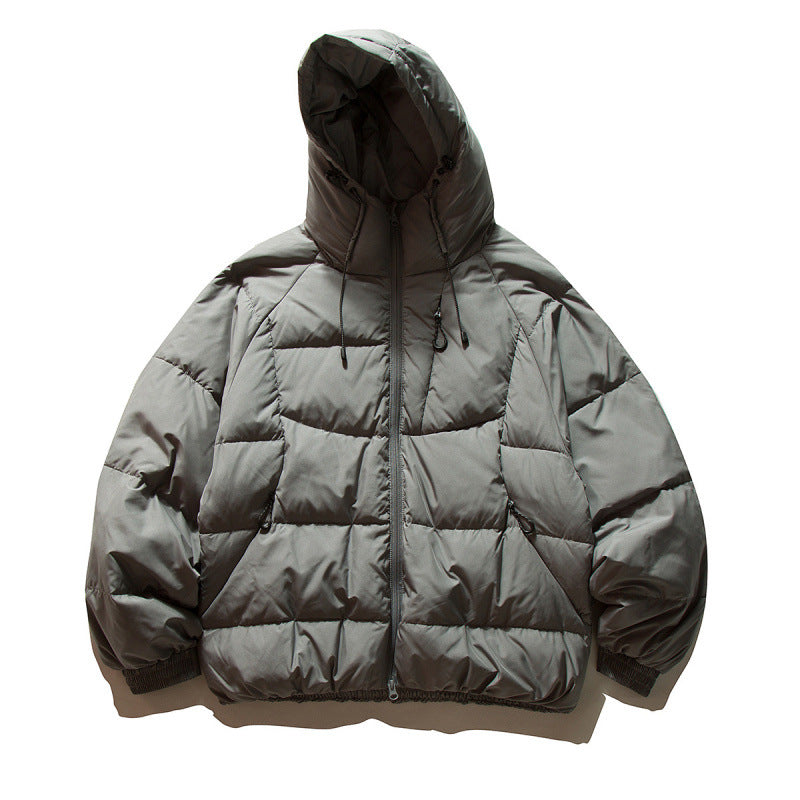 Unisex Oversize quilted jacket in boxy cut with hood and adjustable hem Shop Velvia