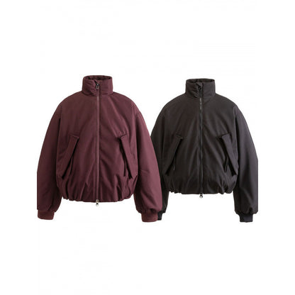 Unisex Boxy quilted bomber jacket with high stand-up collar and flap pockets Shop Velvia