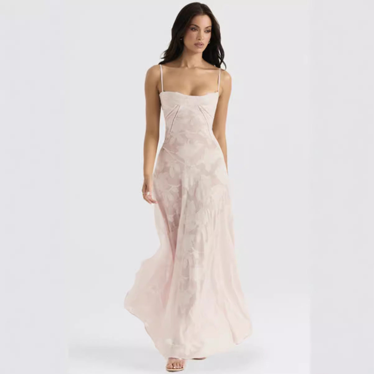Women's figure-hugging maxi dress with bodice construction and spaghetti straps