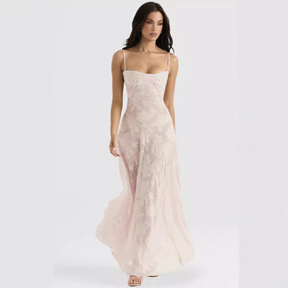 Women's figure-hugging maxi dress with bodice construction and spaghetti straps