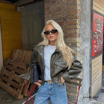 Women Short-Cut Leather Bomber with High Stand Collar, Shoulder Straps and Flap Pockets Shop Velvia