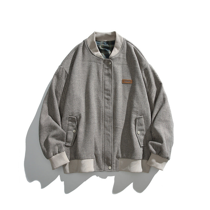 Unisex boxy bomber jacket in herringbone look with ribbed cuffs, flap pockets, and concealed snap button placket Shop Velvia