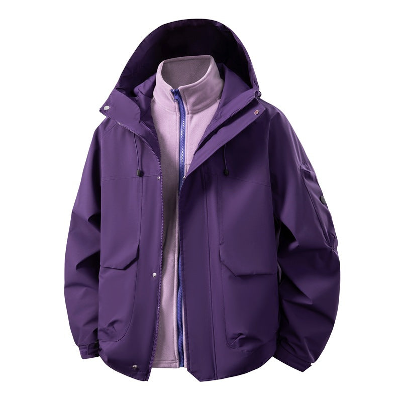 Unisex two-layer softshell parka with removable fleece inner layer, hood, and utility pockets Shop Velvia