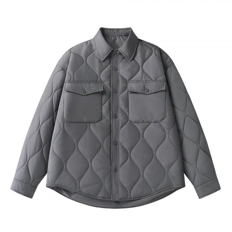 Unisex Padded Quilted Shirt Jacket with Flap Pockets and Curved Hem Shop Velvia