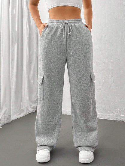 Ladies cargo jogging pants with high elastic waistband, drawstring, and wide leg Shop Velvia