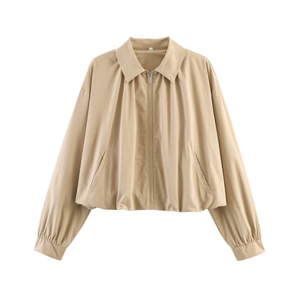 Women's cropped blouse with shirt collar, front zipper and gathered sleeve cuffs Shop Velvia