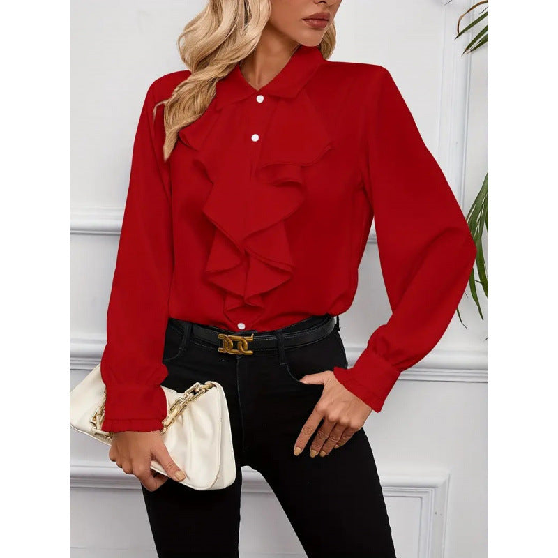 Women’s blouse with refined ruffle details and elegant sleeves