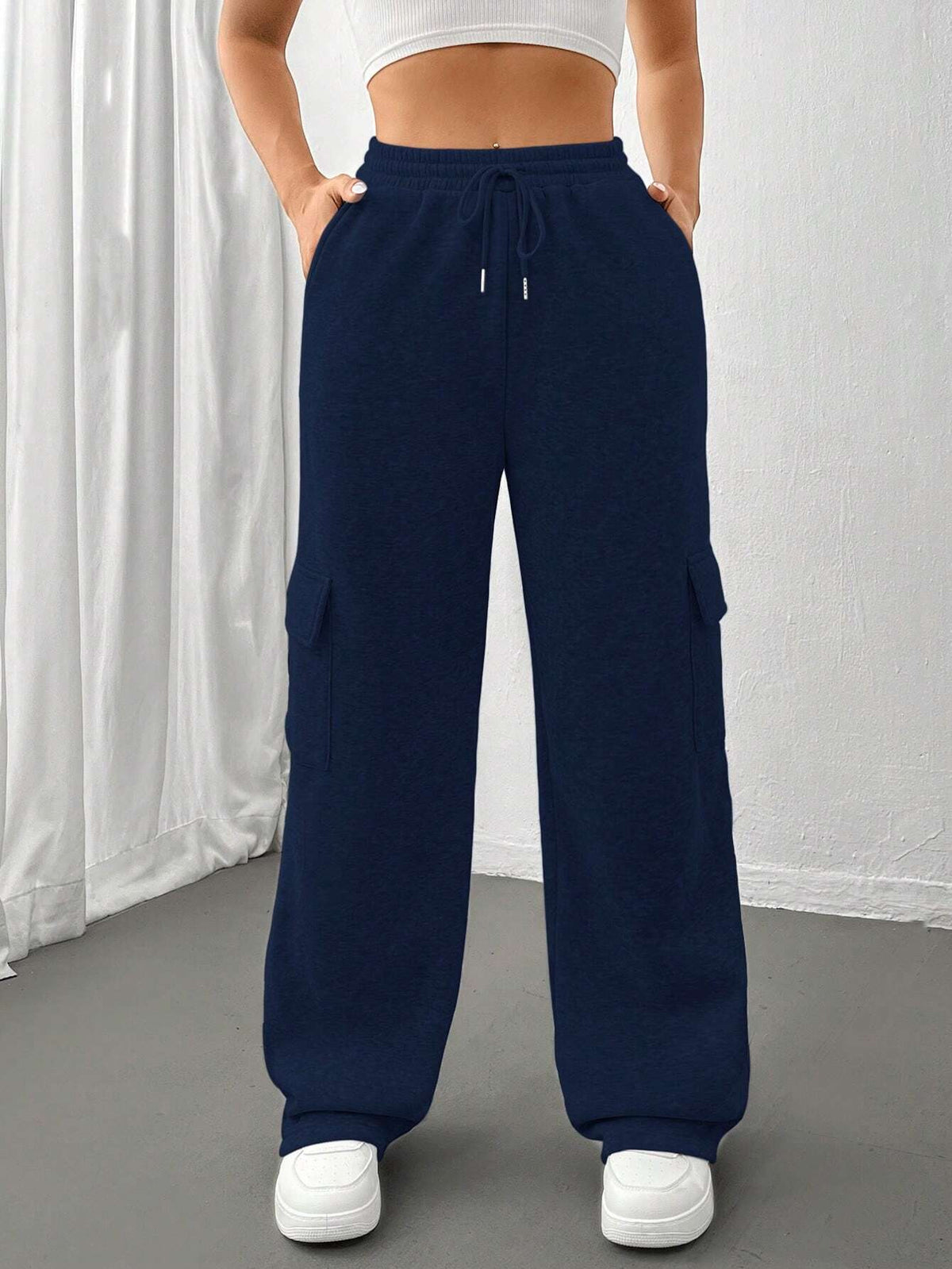 Ladies cargo jogging pants with high elastic waistband, drawstring, and wide leg Shop Velvia