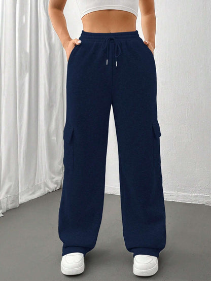 Ladies cargo jogging pants with high elastic waistband, drawstring, and wide leg Shop Velvia