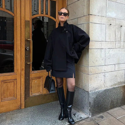Women's 9800+ short boxy wool blend jacket with high funnel collar, asymmetrical button placket and adjustable cuffs Shop Velvia