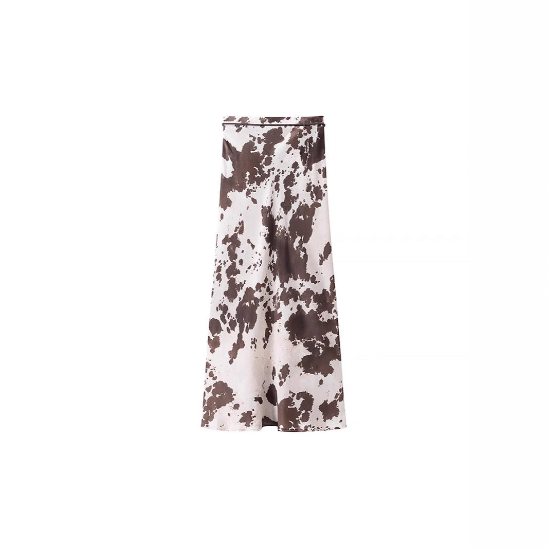 Women's loosely cut shirt blouse with cow spot print and concealed button placket Shop Velvia