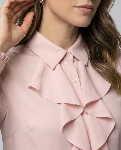 Women’s blouse with refined ruffle details and elegant sleeves