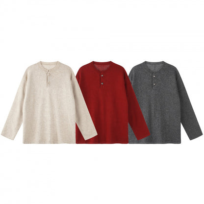 Unisex Oversize knit sweater with Henley button placket, straight hem and light texture Shop Velvia