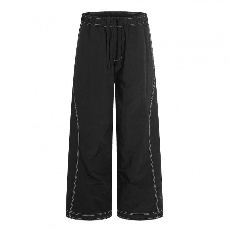 Women's wide pants with elastic waistband, drawstring and contrasting decorative seams Shop Velvia