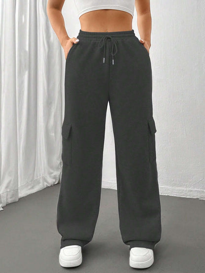 Ladies cargo jogging pants with high elastic waistband, drawstring, and wide leg Shop Velvia