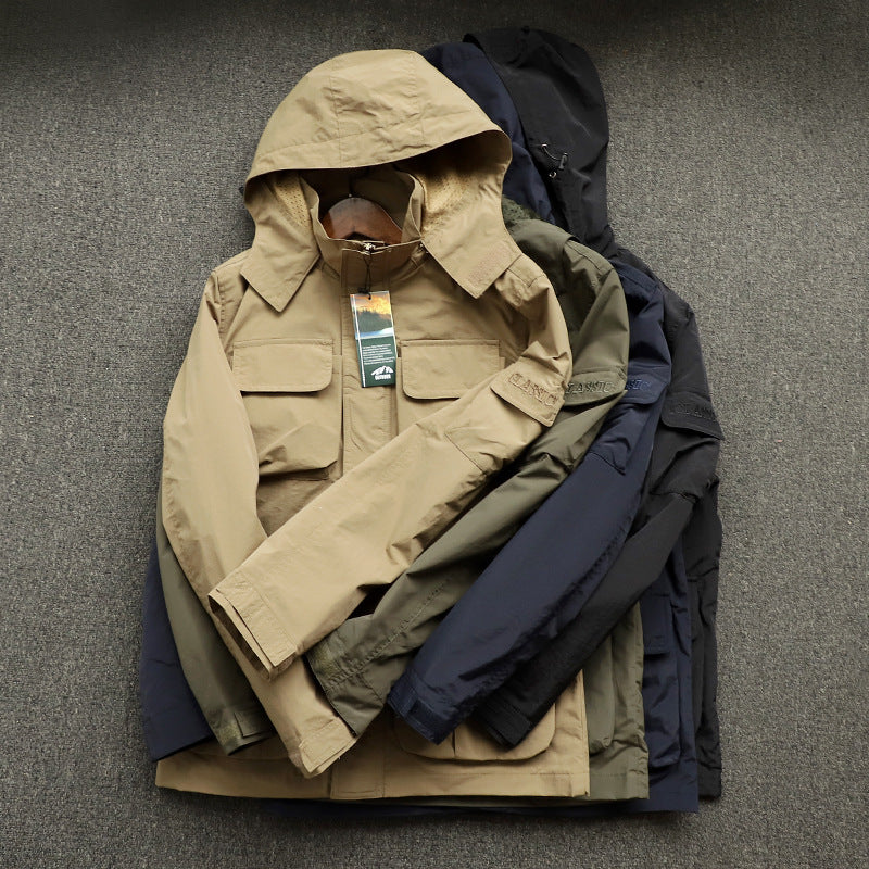 Men's urban field jacket with multiple pockets, wind-resistant surface and concealed hood Shop Velvia