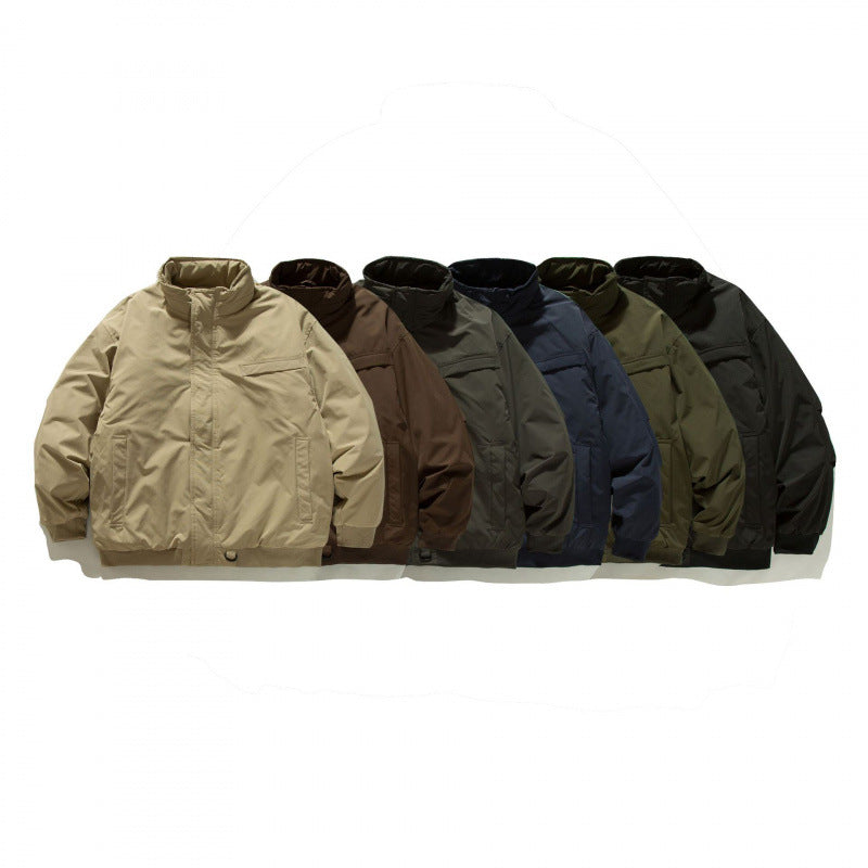 Unisex Boxy-padded transition jacket with high stand-up collar and utility pockets Shop Velvia