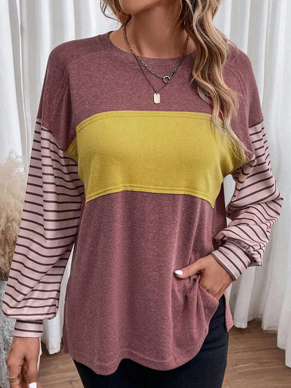 Women's Loose Colorblock Sweatshirt with Striped Sleeves and Round Neck Shop Velvia