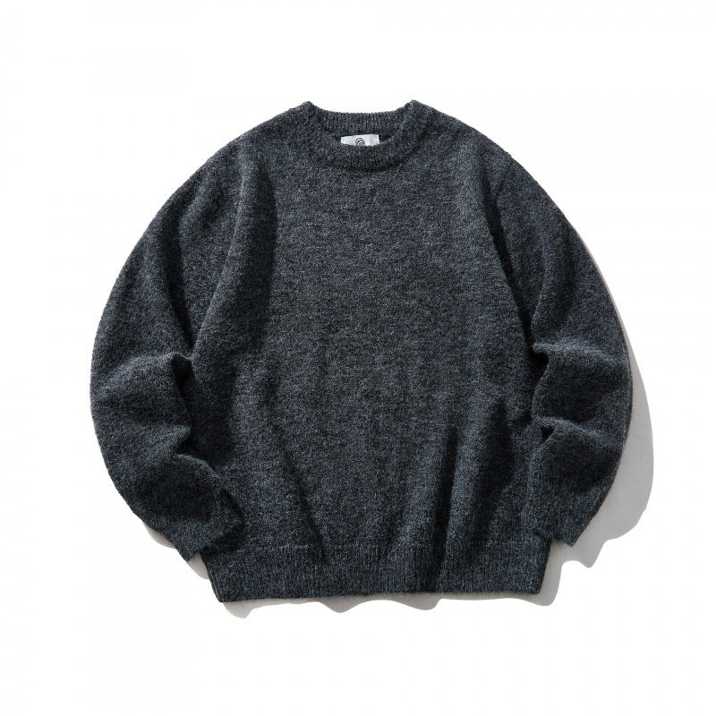 Unisex Oversize fine knit sweater with round neckline, ribbed cuffs, and mottled wool blend Shop Velvia