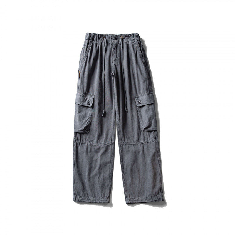 Men's cargo pants with wide leg, elastic drawstring waistband, and patch flap pockets Shop Velvia