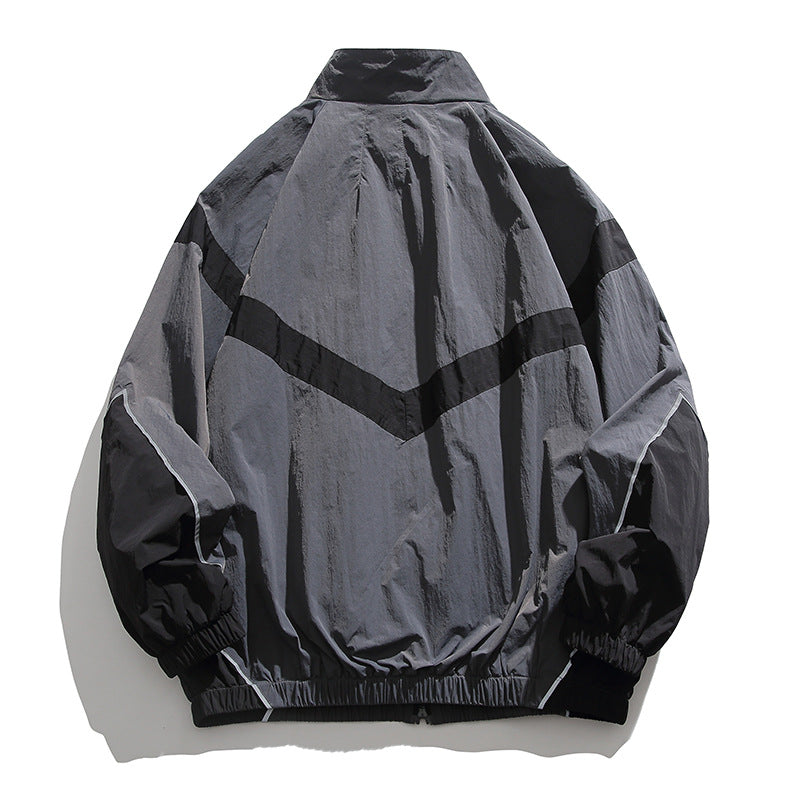 [Unisex] Oversize technical wind and rain jacket with stand-up collar, reflective piping, and elastic hem Shop Velvia