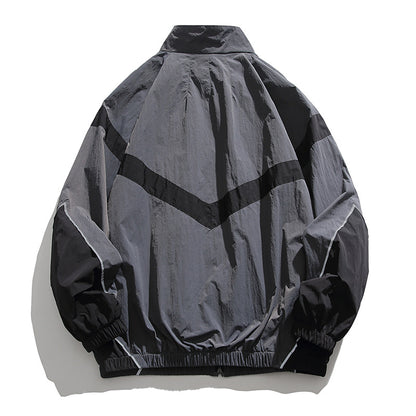 [Unisex] Oversize technical wind and rain jacket with stand-up collar, reflective piping, and elastic hem Shop Velvia