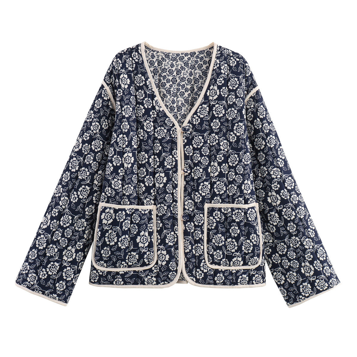 Ladies quilted jacket with floral allover, V-neck, contrast piping and patch pockets Shop Velvia