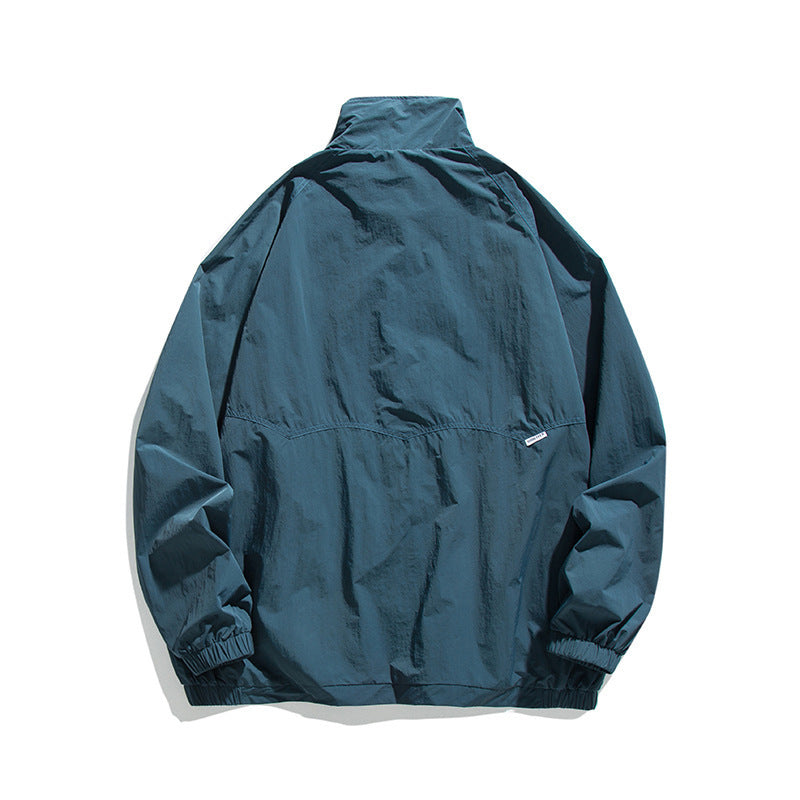 Men's Lightweight Oversized Field Jacket made of technical nylon with stand-up collar, concealed zipper, and flap pockets Shop Velvia