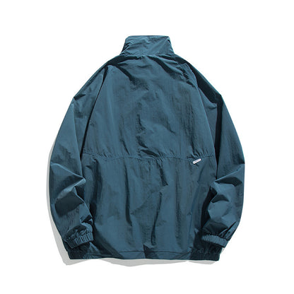 Men's Lightweight Oversized Field Jacket made of technical nylon with stand-up collar, concealed zipper, and flap pockets Shop Velvia