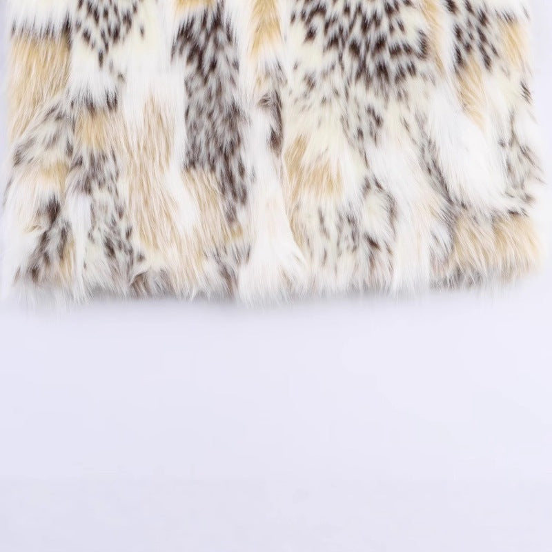 Women Short Cut Faux Fur Jacket with Stand Collar and Voluminous Faux Fur Shop Velvia