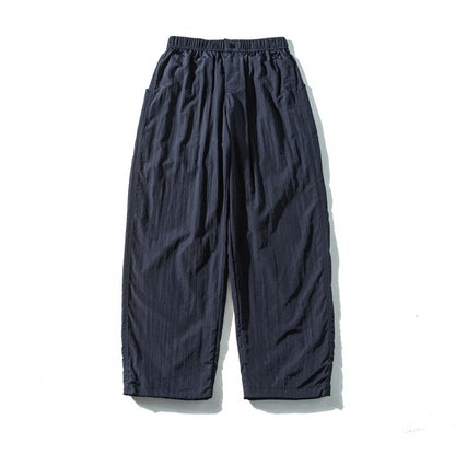 Unisex Loose Crinkle Pants with elastic drawstring waistband, drop-crotch, and side pockets Shop Velvia