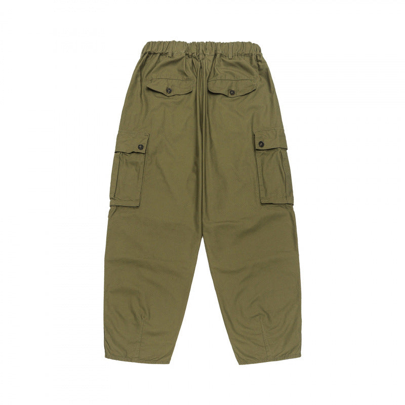 Unisex Oversize Cargo Pants with drawstring waistband, layer detail and snap hem Shop Velvia