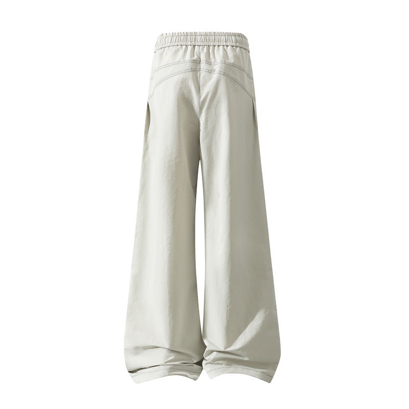Men's Wide Cargo Pants with Drawstring Waistband, Utility Seams and Zip Pockets Shop Velvia