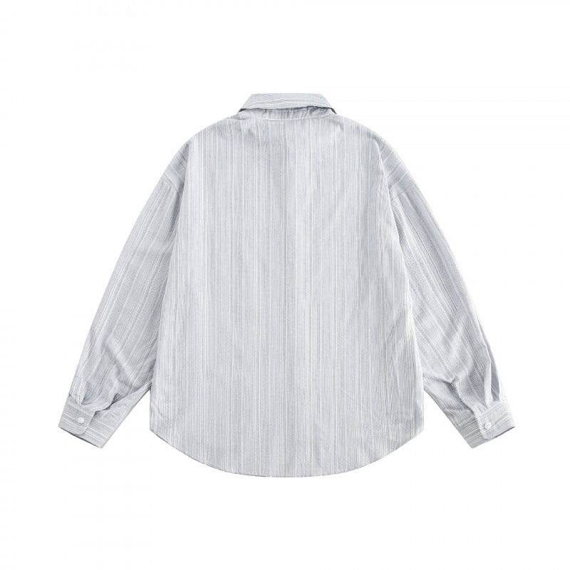 Unisex Oversize striped shirt with chest pocket and rounded hem Shop Velvia