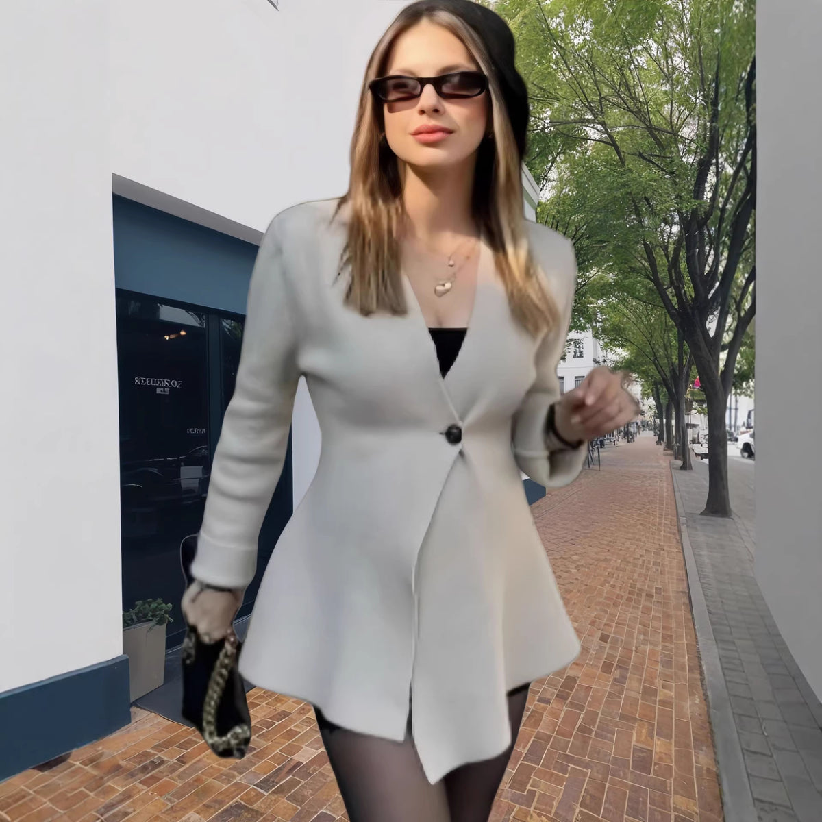 Women's fitted tailored blazer with peplum hem and single-button placket Shop Velvia