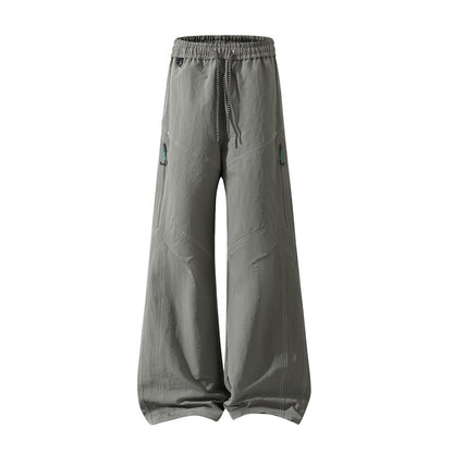 Men's Wide Cargo Pants with Drawstring Waistband, Utility Seams and Zip Pockets Shop Velvia